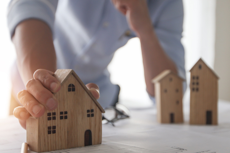 Architect creative designer design and plan to construct residential building or home property